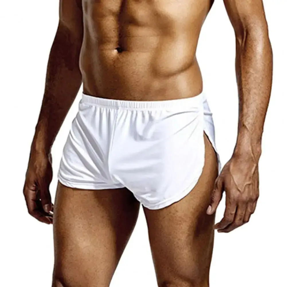 Short taille basse respirant pour hommes, couleur unie, culotte taille élastique, fente latérale, short de salon en soie glacée, sous-vêtements de nuit