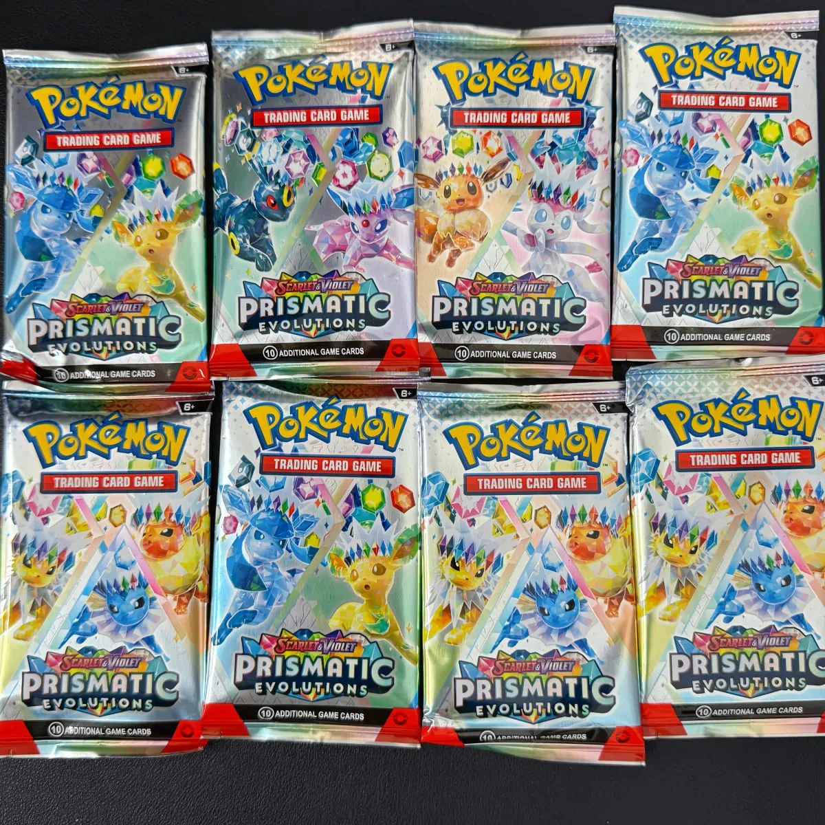 360 db/doboz 10 kártya/csomag angol Pokémon kártya Prismatic Evolutions English Booster Battle tranzakciós kártya ajándékok