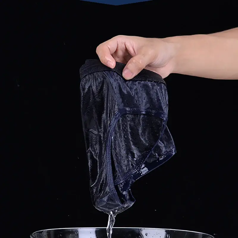 Sous-vêtements pour hommes, culotte triangulaire fine et respirante, slip en soie glacée, en maille, pantalon d'angle carré Sexy pour hommes